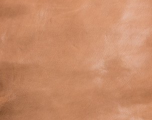 Brown genuine leather for the manufacture of bags, clothes, shoes, furniture. Skin texture.