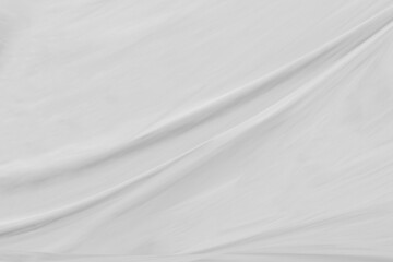 White cloth background abstract with soft waves.