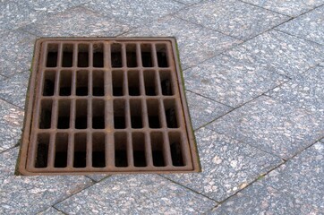 iron hatch drain on the town square