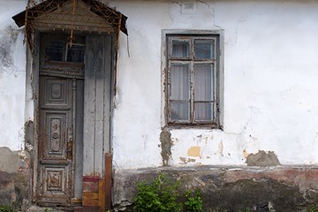 old house with rickety door and window
