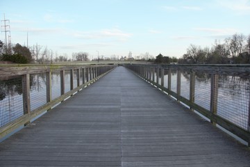 Naklejka premium wooden bridge over the lake