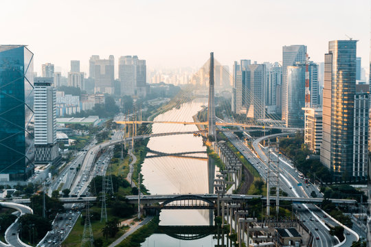 Sao Paulo at the sunset panoramic view of Octavio Frias de Oliveira bridge Vila Ol&iacute;mpia and Cidade Jardim