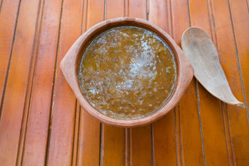 Foreground of the lentil soup, the lentils have been cooked for 3 hours to form their own thick sauce