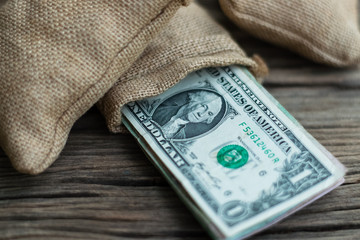 Stacked one dollar bills
