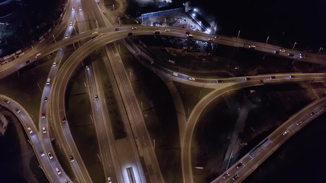Highway intersection aerial view drone footage at night