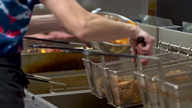 Wings Coming Out Of The Deep Fryer