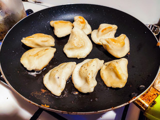 dumplings fried in a pan