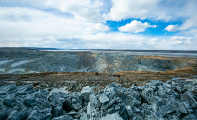 Open pit mining  work of excavators and dump trucks