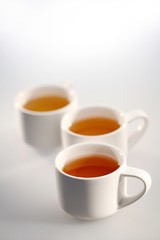 Close up of three cups of tea