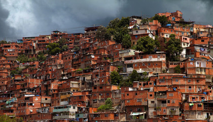 In the crowded and troubled city of Caracas, Venezuela, residents build homes on top of each other...