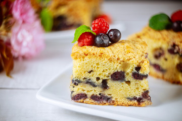Berry coffee cake cut into squares.