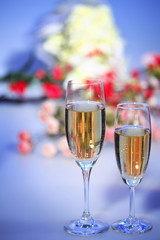 Champagne flutes filled with champagne
