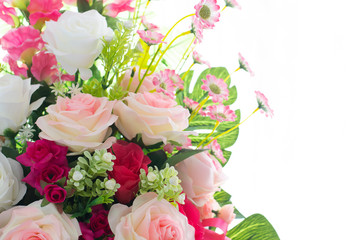 Beautiful colorful decoration artificial flower isolated on white background.