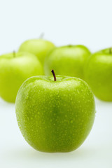 Green apples with water droplets