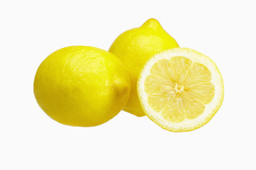 Whole and halved lemons