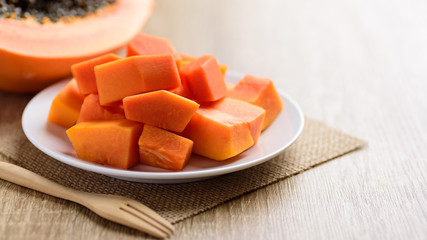 Sliced ripe papaya fruit on plate, Tropical fruit