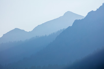 Teton mountains covered in smoke