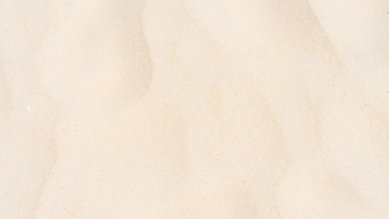 Fototapeta na wymiar Sand texture in summer sun