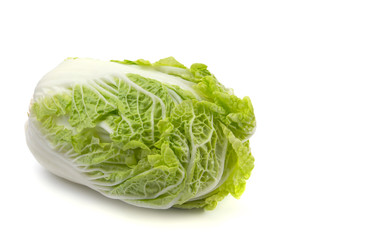Peking cabbage close-up on a white isolated background, free space