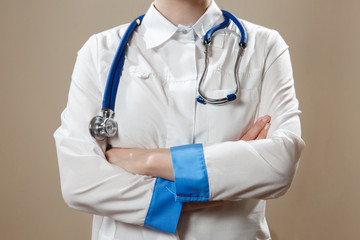 Health care and medical services concept. Close up of Medical doctor with a stethoscope in the hands.