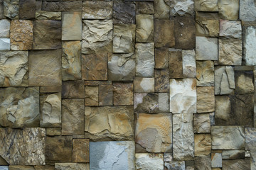 Wall of natural treated stone blocks.