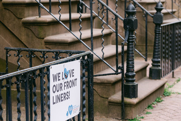 Hoboken, NJ, USA - May 18th 2020 : Sign on a residential building expressing gratitude to front liners and  spreading a message of love, solidarity and community support