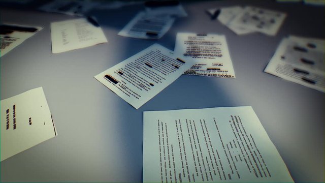 Top secret information concept. Investigator desk with top secret sheets