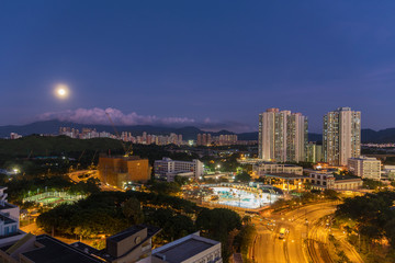 Fototapeta na wymiar Full moon over Hong Kong City