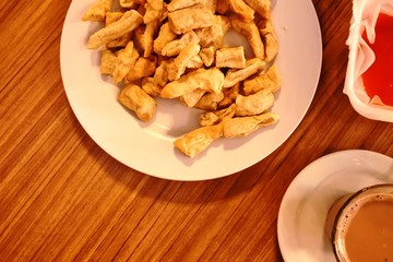 Grilled fish cake parcels from Jakarta. Otak otak food. Served with two kinds of spicy sauces