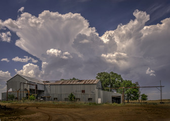 Abandoned structures on the Great Plains during springtime storms