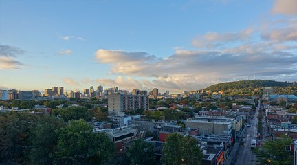Fototapeta na wymiar Wide view from the 10th floor of Mont Royal, the Plateau area, the Ville Marie area, and Down-Town. The north-east side of mount Royal. Perspective of Rachel street towards the mountain.
