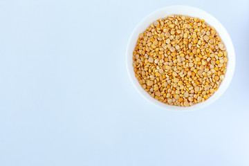 Yellow and green peas isolated on white background