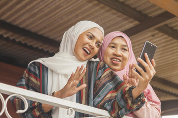 Mother and daughter on a video call