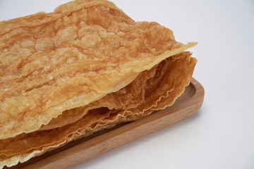 The candied beancurd sticks are in the white background