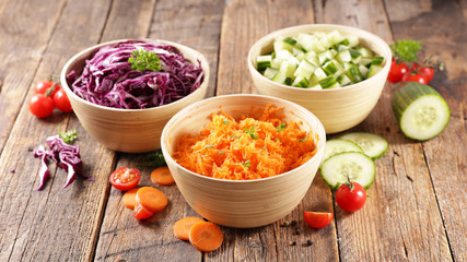 assorted of vegetable salad, cabbage, cucumber and grated carrot