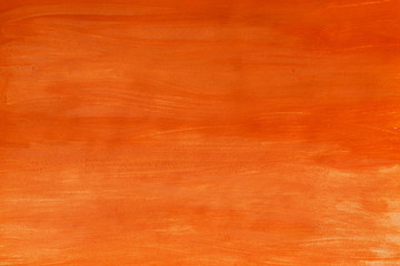 Abstract hand painted orange background. Abstract red-yellow background texture. Red color on gouache paper.