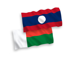 Flags of Madagascar and Laos on a white background