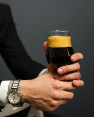 man with a glass of beer