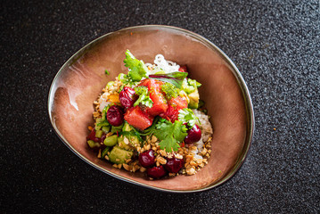 poke bowl with salmon  and berries