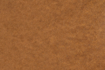 wood background: light brown pressed wood fiber board. hdf stove