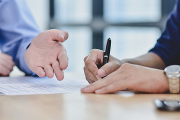 Fototapeta premium Man signature contract agreement buying home