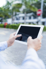Man using a digital tablet
