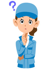 疑問を感じる青い作業着の女性
