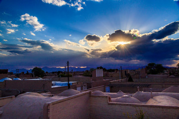 Fototapeta premium ancient village in Yazd-Iran in a lovely day with beautiful and colorful sky and amazing sunset.