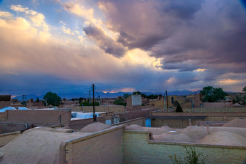 ancient village in Yazd-Iran in a lovely day with beautiful and colorful sky and amazing sunset.