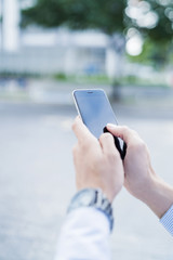 Man using mobile phone outdoors