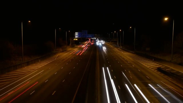 A time lapse of a motorway at night, good flow of traffic. Shot just outside greater London.