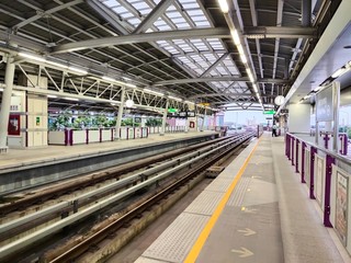 subway train in the station, empty staircase and escalator at sky train station, high stair case in...