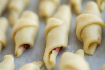 Step-by-step instructions for making bagel cookies preparation for a croissant with jam. Step 4...