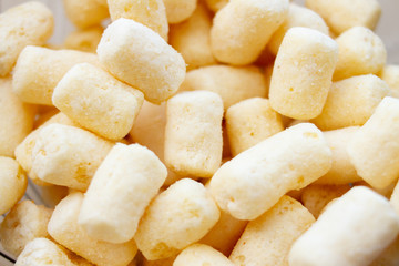 Yellow Corn sticks sugar, closeup. Background of corn sticks.